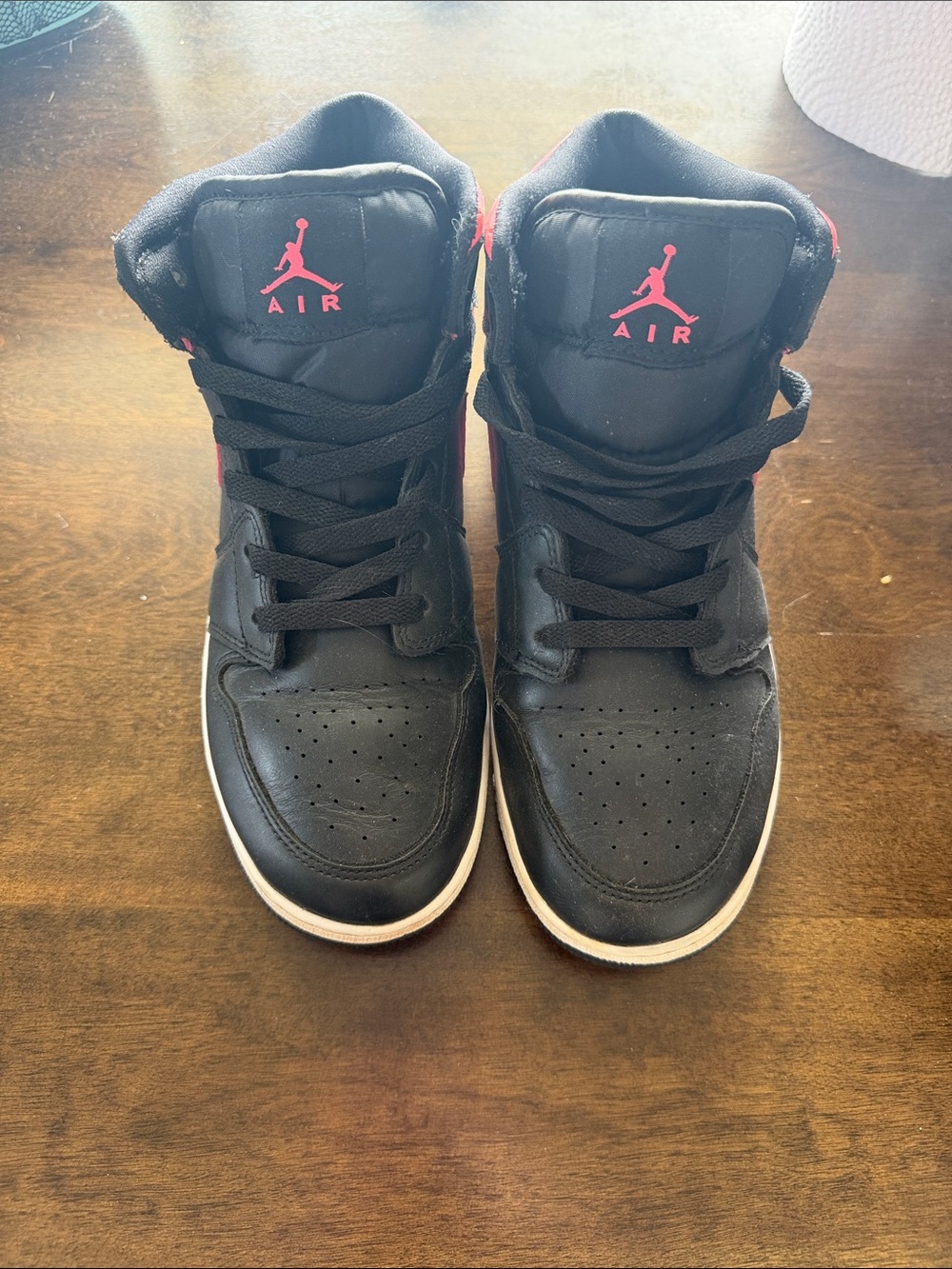 Jordan women Black Sneakers with Pink Jumpman Accents